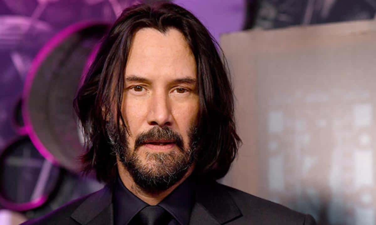 1564344071921.jpg keanu reeves ferma l auto per firmare un autografo